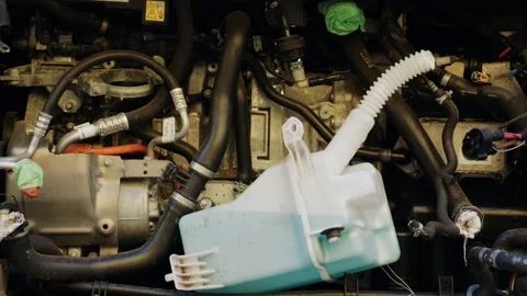 Close up front view of a dismantled car with exposed engine components, hoses, Stock Footage 339738154