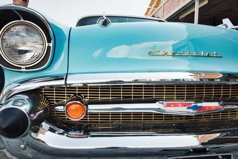Close-up front view of the grill and bumper of an aqua marine blue 1950s Chevy Fotos de archivo