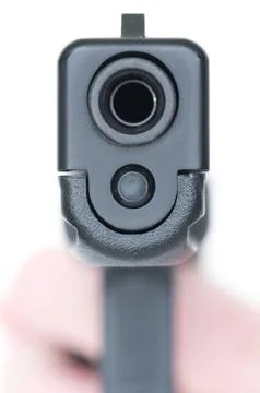Close front view of handgun Stock Photos