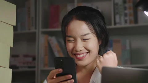 Close up front view of happy young Asian woman having new order from customer 스톡 동영상 171802681