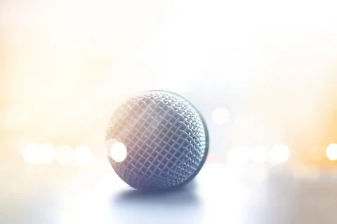 Close up front view of microphone in concert hall on stage floor 스톡 사진