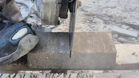 Close Up Front View Of Stone Cutter Cutting Paving Brick Stock Footage 336631360