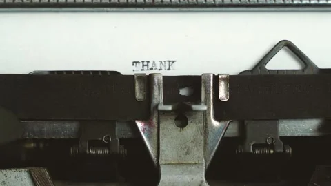 Close up frontal view typing text " thank you " on a old typewriter Видео 149347623