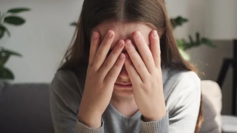 Premium Photo  Child girl sad profile face close up with hands on