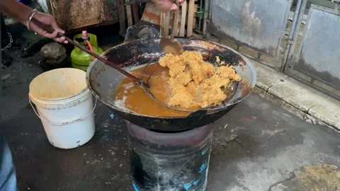 Close up of frying crispy fried chicken in a large wok with boiling oil . Stock Footage 323718249