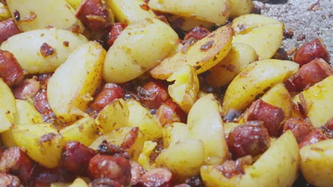 Close-up of a frying pan with potatoes Stock Footage 245802996