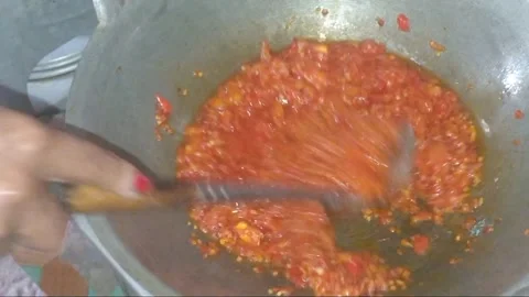 Close Up of Frying Red Chili Paste Sambal on Old Kerosene Stove Stock Footage 328274034