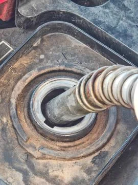 Close Up of Fuel Nozzle Inserting into Tank Filler Neck Stock-Fotos
