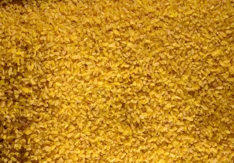 Close-up full frame background of raw bulgur wheat grains Stock Photos