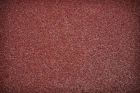 Close up Full Frame Shot in red runing track rubber texture Stock Photos
