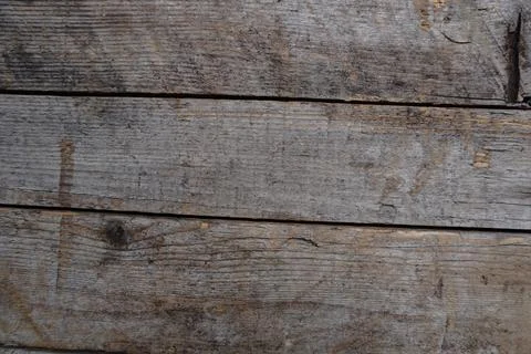 Close-up full-frame view of weathered gray wooden planks showcasing rustic 写真素材