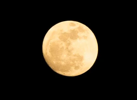 Close up full moon isolated on black background. Full moon on dark night. Stock Photos