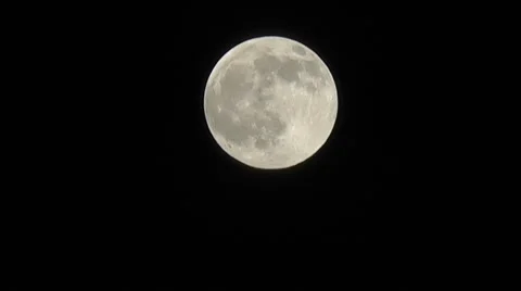 Close-up of a full moon - real time Stock Footage 49937971