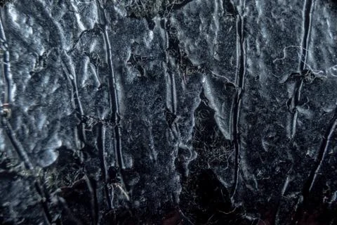 Close-up fullscreen macro with shallow depth of field of a texture similar to Stock Photos