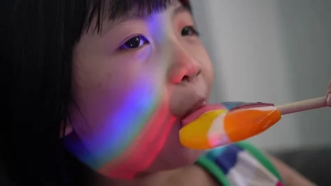 Close up the funny face of chinese kid t... | Stock Video | Pond5