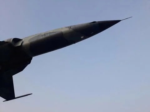 Close up fuselage and front line cockpit of jet military air plane Photos