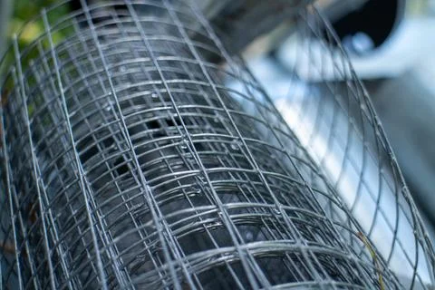 Close-up of a galvanized steel wire mesh roll used for construction 库存照片