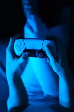 Close up game console in hands Stock Photos
