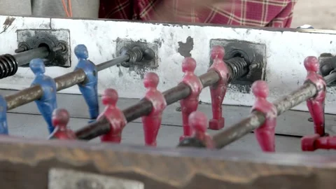 Close up of a game of foosball or table soccer being played. Stock Footage 308472805
