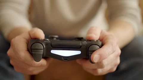 Close-up of Gamer Hands Holding Wireless Controller for Video Games. Close-.. Stock Footage 331971542
