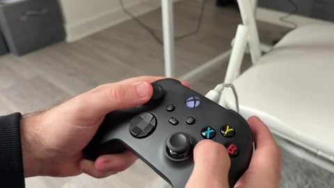 Close Up of Gamer Man Using Xbox Controller While Playing Video Game Stock Footage 337140255