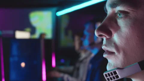 Close-up of a gamer's face while playing Video stock 149310169