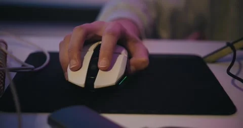 Close-up of a Gamer's Hand Clicking a Computer Gaming Mouse Stock Footage 329074247