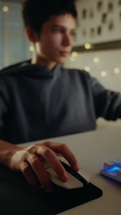 Close-up of a Gamer's Hand on a Computer Mouse During Gameplay Stock Footage 336316814
