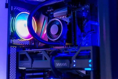 Close up of gaming computer interior showing rgb cooling fan, liquid cooled.. Stockfoto's