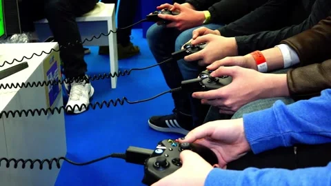 Close Up Of Gaming Controllers and Gamers Stock Footage 269672626