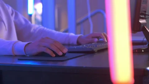 Close-up of gammer's hands using computer mouse and keyboard Stock Footage 130656482