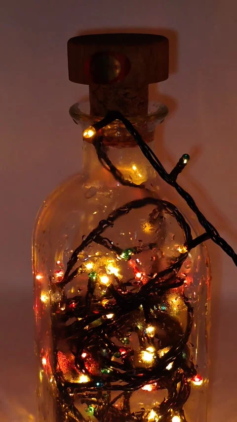 A close-up of a garland in a bottle Stock Footage 323761971