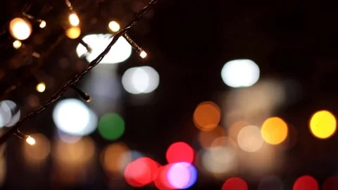 Close up of garland lightbulbs. Bokeh effect. Decoration for Christmas and New Stock Footage 83657954