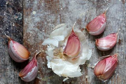 Close up of garlic on boards Stock Photos