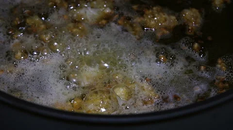 Close-Up of Garlic Sauté Stock Footage 50759859