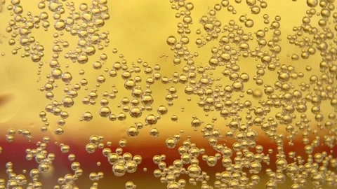Close-up of gas bubbles in a beer mug. slow motion Stock Footage 134947234