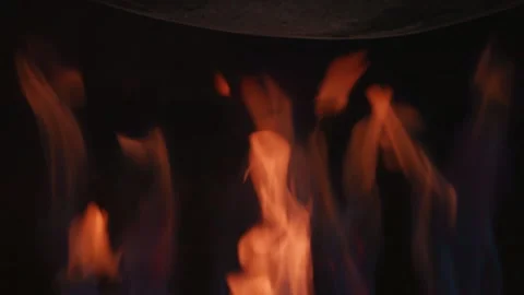 Close-Up of Gas Burner Flames on Black Background Under Cauldron for Pilaf Stock Footage 346609937