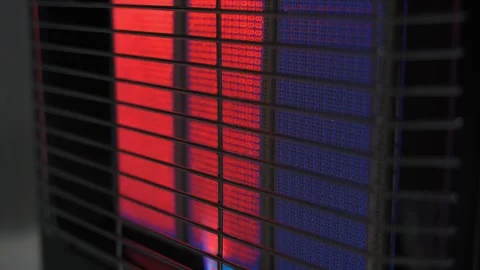 Close-up of a gas heater in the process of warming up to operating temperature Stock Footage 284928151