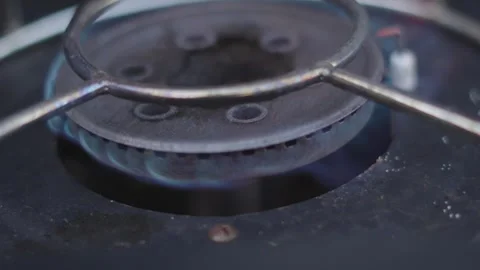 Close-up of Gas Stove Burning with Blue Flames. Stock Footage 343899113