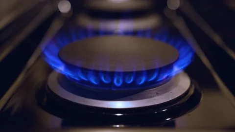Close up of gas stove flames Stockbeeldmateriaal 229911209
