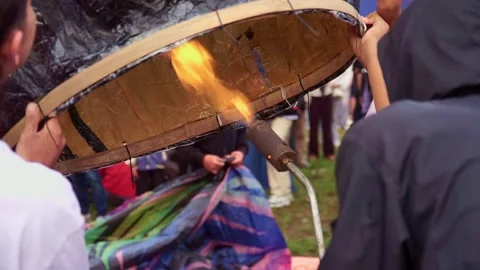 Close-up of a gas torch flame heating a hot air balloon. Stock Footage 334796976