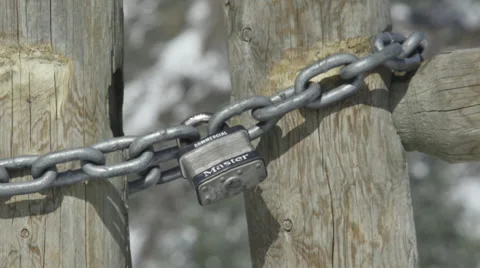 Close up of the gate lock on a snowy mountain road Stock Footage 47382134