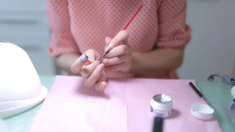 Close Up Gel Nail Polish Application Woman Manicurist's Self Care Session Stock Footage 327913153