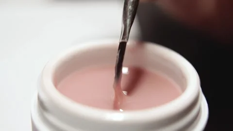 Close-Up of Gel Polish Being Loaded onto Nail Brush Stock Footage 314494510
