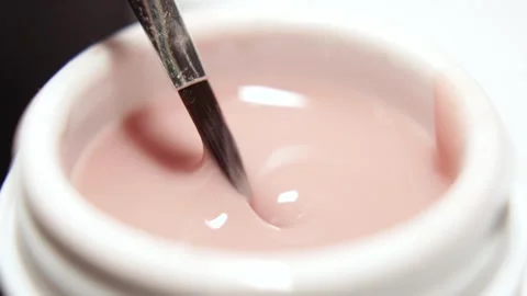 Close-Up of Gel Polish Being Loaded onto Nail Brush Stock Footage 317510685