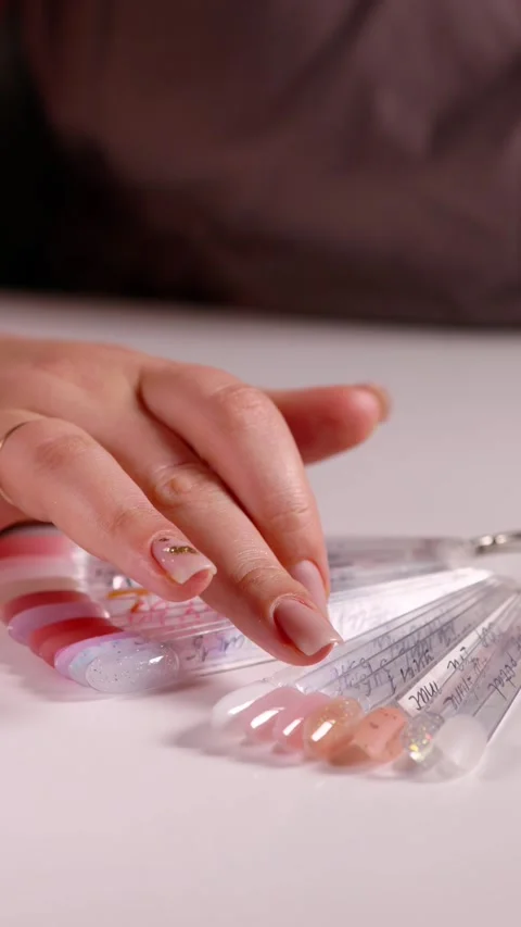 Close-Up Gel Polish Sorting Stock Footage 260439906