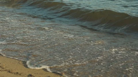 Close-Up of Gentle Beach Waves Washing Ashore Stock Footage 280412311