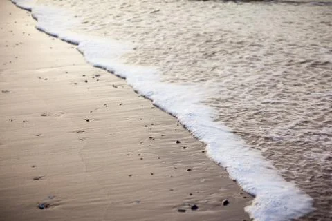 Close-up of Gentle Surf on a Beach Stock Photos