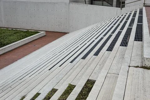 Close up to a Geometric pattern of a modern white street stairways Foto stock