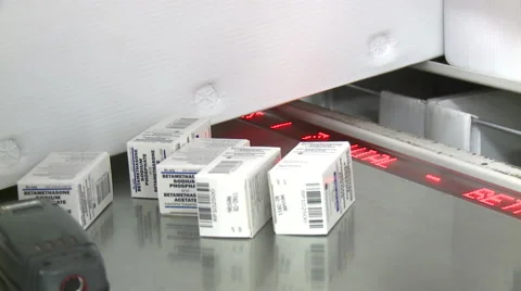 Close up of getting medications in boxes and counting them Stock Footage 50625695